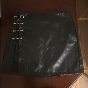 Chic Black Mini Skirt with Gold Accents